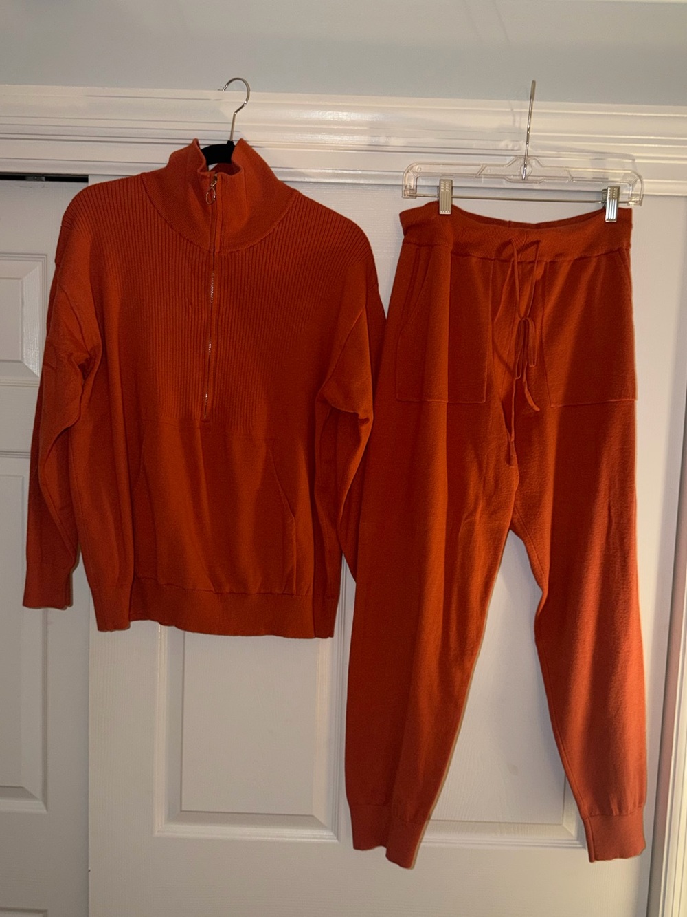 Two piece lounge set orange/rust with quarter zip silver zipper, jogger pant